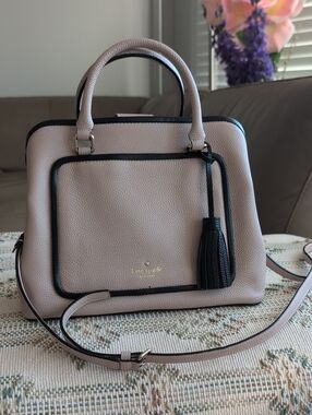 Kate Spade Taupe with black trim pebbled leather purse